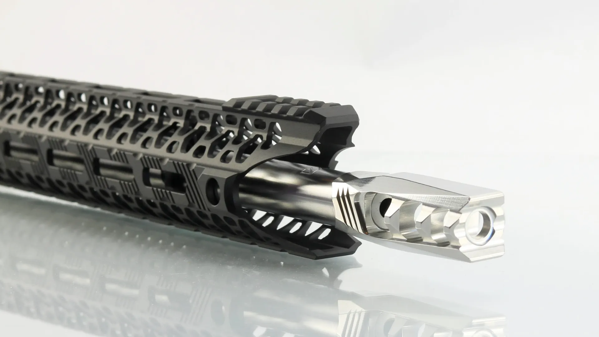 muzzle brake vs compensator